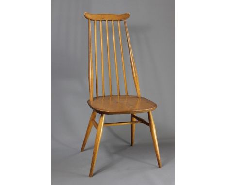 Three Ercol Dining Room Chairs; the spindle back chairs, stretchers and tapered legs (3)