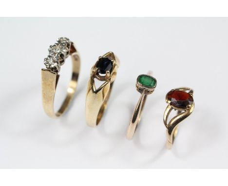 Four Vintage 9ct Gold Rings. This lot includes 9ct three-stone diamond ring size Q, 9ct sapphire ring set with an oval sapphi