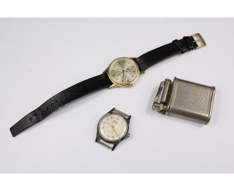 A Vintage Favre Leuba Twin Power Wrist Watch, the watch having a champagne face with baton dial, date aperture, case nr 82092