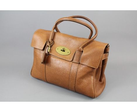 A Mulberry Light Tan Leather Lady's Handbag; the handbag having double handles with leather strap trim, approx 36 x 26 cms, i