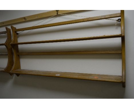 AN ERCOL ELM TWO TIER HANGING PLATE RACK