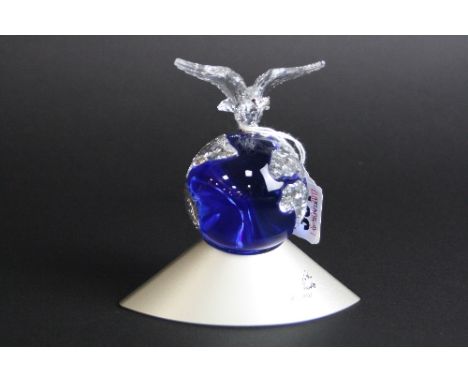 A BOXED SWAROVSKI 'CRYSTAL PLANET VISION 2000', with Dove holding leaf, also with paperwork