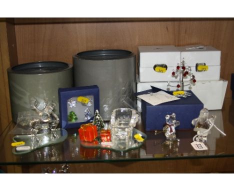 SIX BOXED SWAROVSKI CRYSTAL CHRISTMAS/WINTER THEMED ITEMS, to include Santa, Christmas Tree with baubles, Kris Bear Skier, Sl