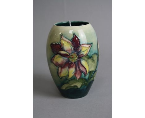 A MOORCROFT POTTERY VASE, 'Dahlia' pattern, impressed backstamp, approximate height 13cm