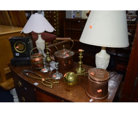 A SLATE MANTLE CLOCK, a pair of table lamps and a quantity of brass and copper including a kettle, candlesticks, etc