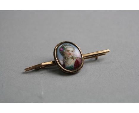 A DISTRESSED PAINTED ENAMEL BAR BROOCH