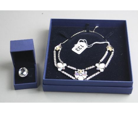 A SWAROVSKI NECKLACE AND RING