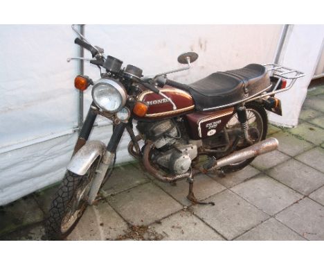 A HONDA CD200TB MOTORBIKE, Reg No A142 LRE, 198cc engine, six previous owners, no receipts or MOT, V5C present, mileage shows