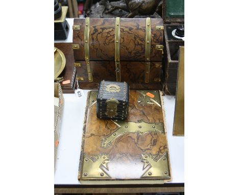 A VICTORIAN GOTHIC BURR WALNUT STAINED AND GILT BRASS BOUND STATIONERY BOX, inside bears retailers label for Alexander Jones 