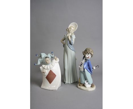 THREE NAO FIGURES, to include boxed Clown walking No 00486, 'Ace of Diamonds' No 1279 and figurine with shawl and hat (chip t