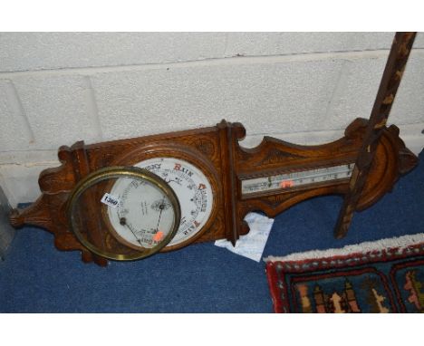 AN OAK ANEROID BAROMETER, signed Gray & Selby, Nottingham (sd)