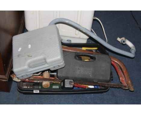 A BOX OF HAND TOOLS, including two electric drills, various saws etc