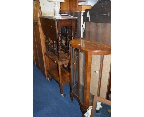 A WALNUT CHINA CABINET,trolley, an oak barley twist table, a wicker linen basket, log box, two dressing mirror and a lamp (8)