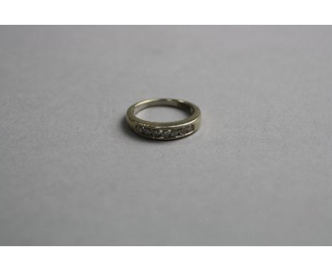 A 9CT DIAMOND HALF ETERNITY RING, ring size K, approximate weight 3.0 grams
