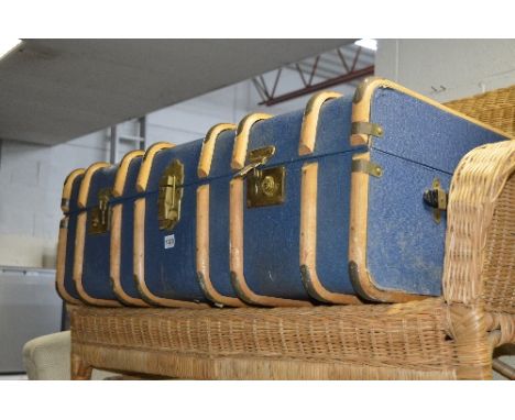 A WOODEN BANDED TRAVELLING TRUNK and a boxed gazebo (2)