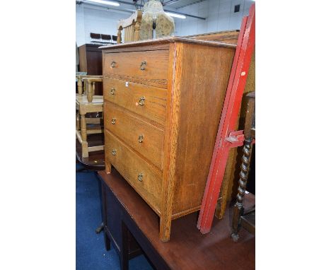 A LIGHT OAK CHEST, of four long drawers