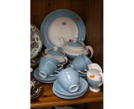 ROYAL DOULTON TEASET, light blue and white, teapot, covered sugar, milk jug, cake plate and six trios