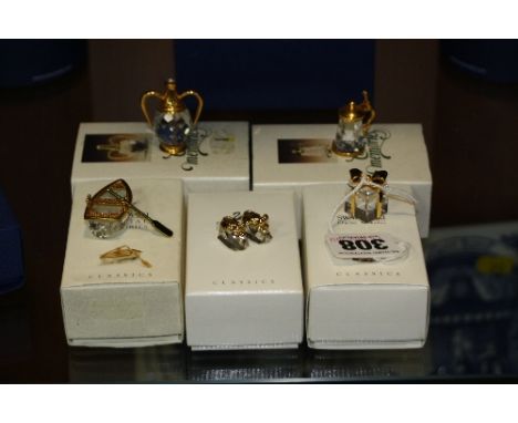 FIVE BOXED SWAROVSKI CRYSTAL MEMORIES, to include present, pair baby booties, rowing boat (only one oar), tankard and a twin 