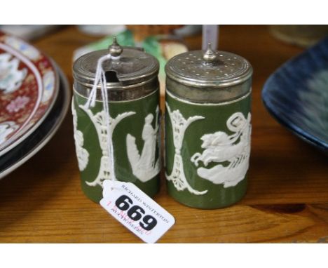 A CARLTONWARE CRUET SET, green jasperware design, glazed (2)