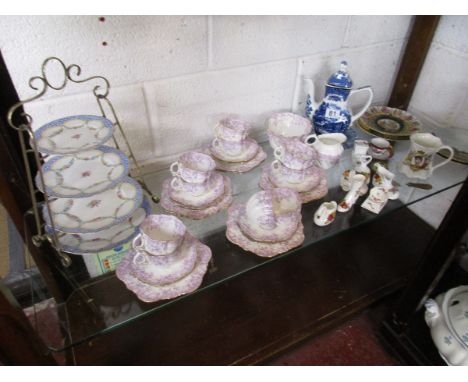 Shelf of china
The plates on the four tier cake stand have "Crescent &amp; Sons" back stamps and impressed marks.There are 10