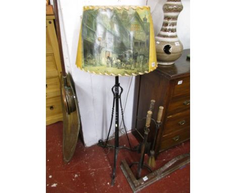 Wrought iron standard lamp with coaching scene shade