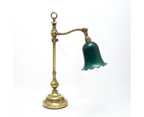 A BRASS LIBRARY DESK LAMP, with green shade, 57cm high