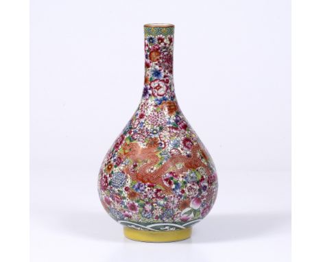 AN EARLY 20TH CENTURY CHINESE BOTTLE VASE, ceramic decorated by millefiori and dragon pattern, with a blue character mark to 