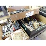 Assorted bars and end mills.