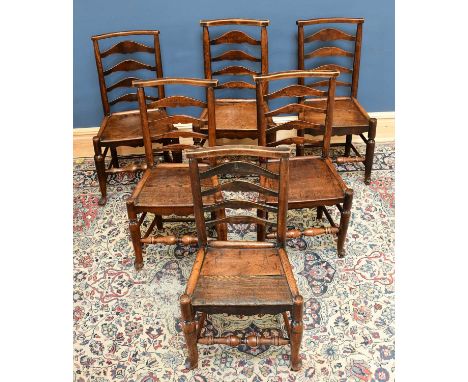 A harlequin set of six 19th century North Country ladder back chairs with solid seats.