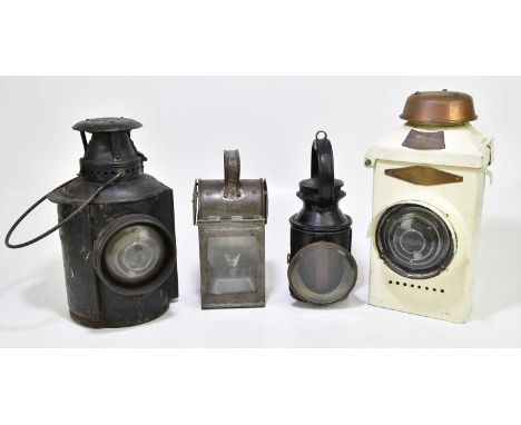 Four railway lamps to include the Adlake lamp, etc (4).