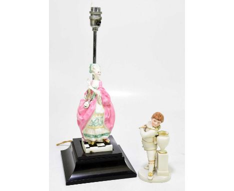 ROYAL WORCESTER; a figure mounted on a lamp base, 'The Masque', together with a further figure.