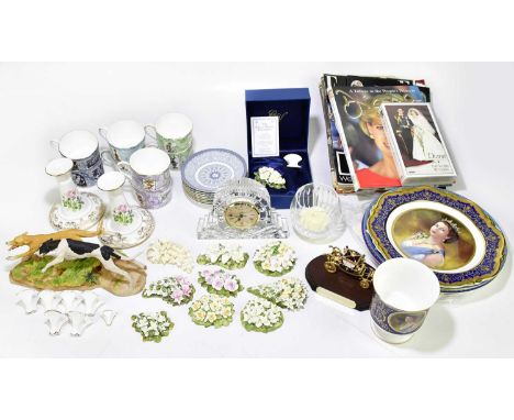 An assortment of decorative ceramics and glassware including a pair of Spode candlesticks produced to commemorate  Queen Eliz