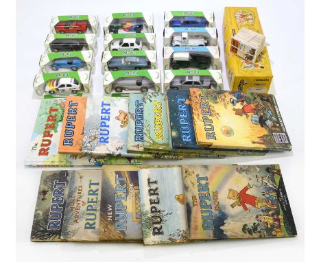 PELHAM; a standard puppet, together with a group of Mobil model cars, and a collection of Rupert annuals.