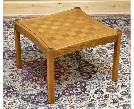 ERCOL; a Seville chess top coffee table, height 42cm, width 59cm, depth 59cm.