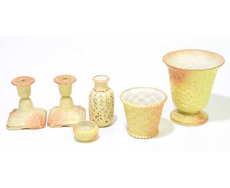 ROYAL WORCESTER; six pieces of blush ivory to include a vase, a pair of candlesticks, a smaller vase, a smaller vase modelled