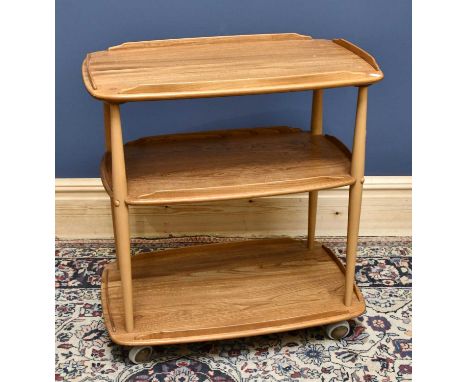 ERCOL; a mid 20th century ash and beech three tier trolley, height 77cm, length 71cm.