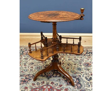 A Victorian burr walnut reading table with revolving candlestick, height 67cm.