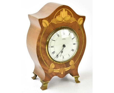 DIMMER, SOUTHSEA; an Art Nouveau style inlaid walnut mantel clock, the white enamel dial set with Roman numerals, height 21cm