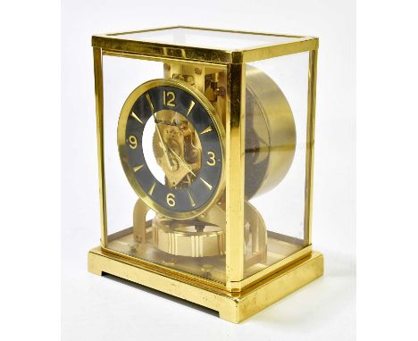 JAEGER LECOULTRE; an Atmos clock, the black dial set with quarter Arabic numerals, height 22cm, width 18cm, depth 14cm.Condit