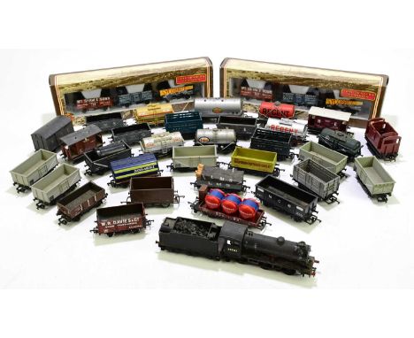 A mixed collection of OO gauge tenders to include Bachmann, Mainline and Lima.