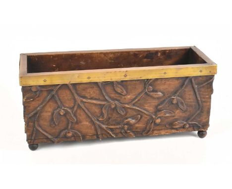 A rectangular planter carved with mistletoe, height 17cm, width 39cm, depth 14cm.
