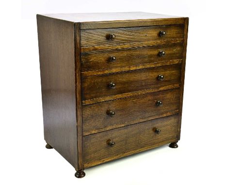 An oak five drawer tool chest, 50cm x 44cm x 28cm.