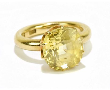 An 18ct yellow gold citrine set ring, 5.6g.Condition Report: Size F, stone approx length of stone approx 10mm, width approx 8