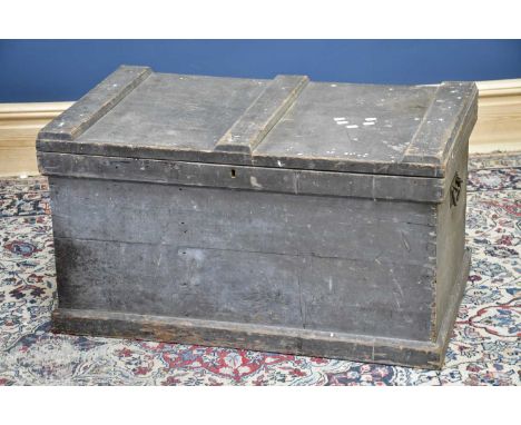 A black painted pine tool chest, height 47cm, width 90cm, depth 55cm.
