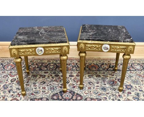 A pair of reproduction marble gilt topped tables with ceramic inserts, height 53cm, width 46cm, depth 46cm.
