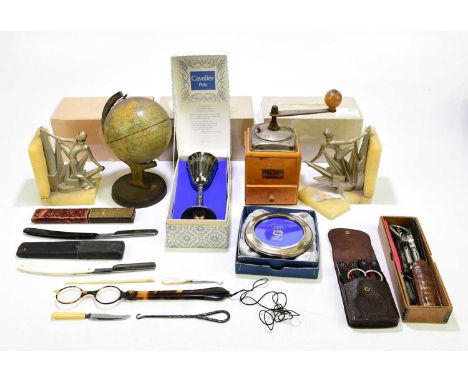 An assortment of collectors' items to include a tinplate globe, a pair of Art Deco chromed metal and alabaster book ends (af)