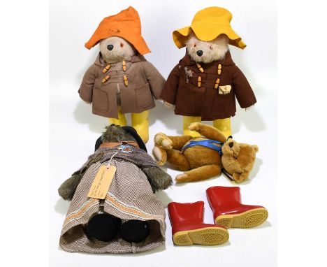 Two vintage Paddington Bears with Dunlop wellies, a further spare pair of Dunlop wellies, a Merrythought plush bear and a fur