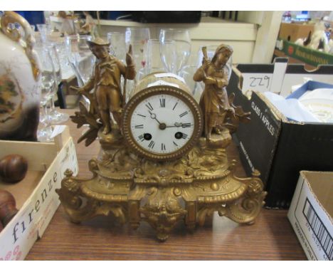 GILT MANTEL CLOCK WITH TWO FIGURES TO TOP