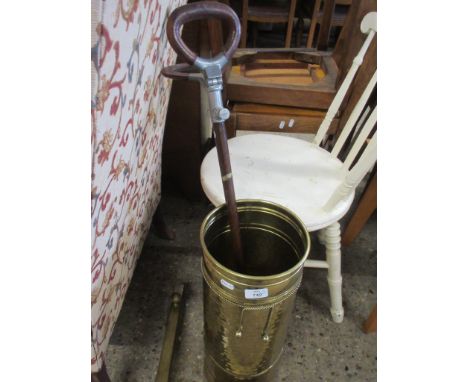 BRASS UMBRELLA OR STICK STAND CONTAINING A VINTAGE SHOOTING STICK