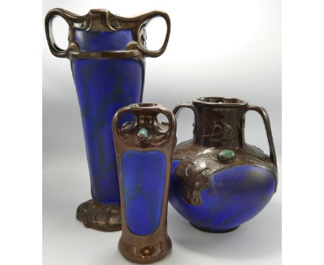 A collection of Bretby Art Nouveau two handled vases: Comprising vase shape 1677, 1550 and 1677, set with Ruskin style adornm